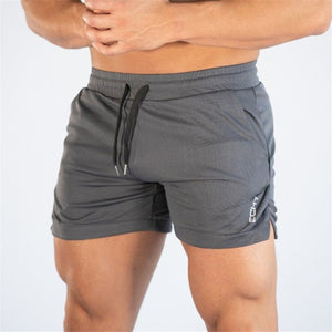 2019 männer Fitness Bodybuilding Shorts Mann Sommer Turnhallen Workout Männlichen Atmungsaktive Netz Schnell Trocken Sportswear Jogger Strand Kurze Hosen